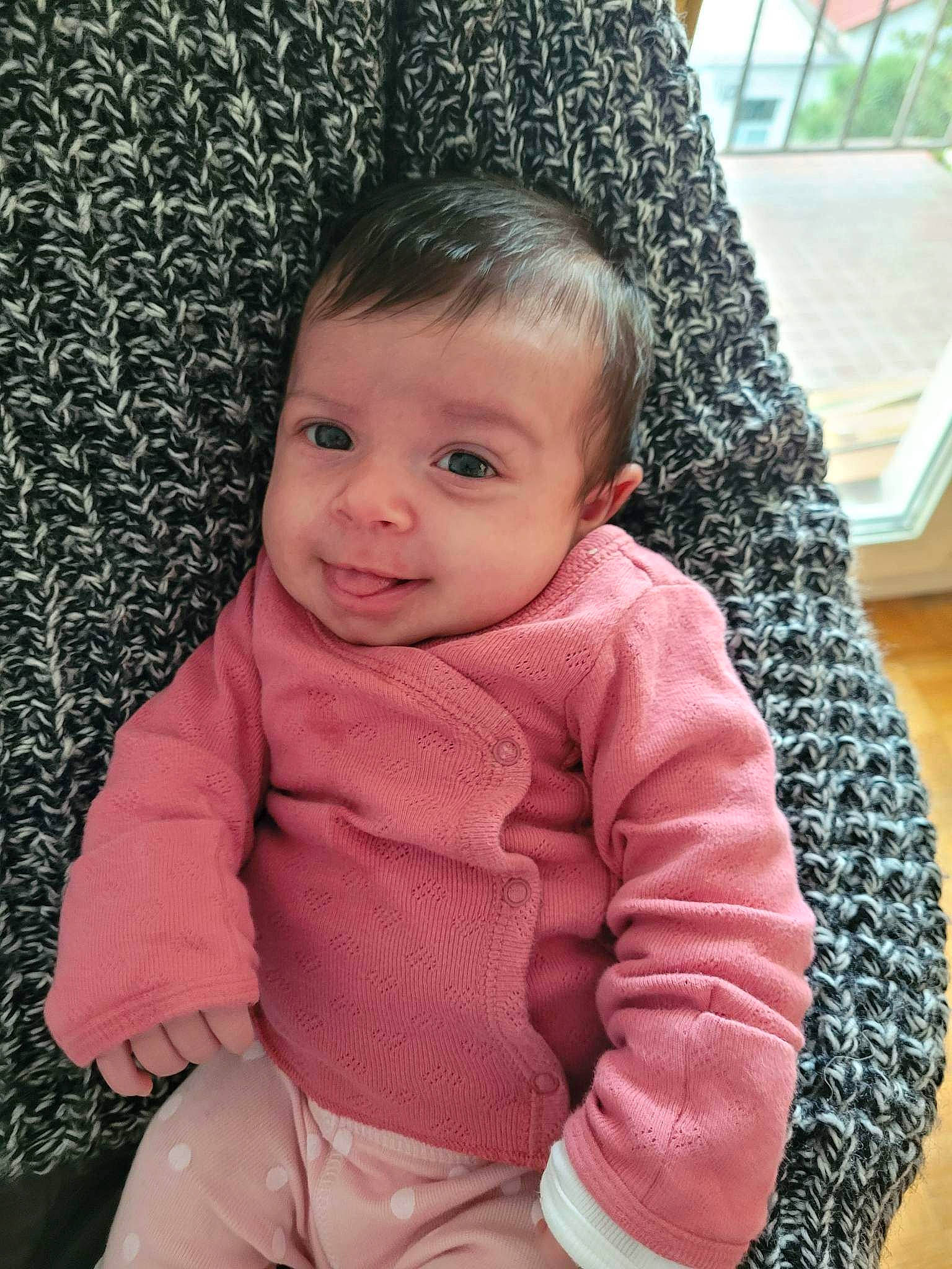 Jasmine participe au concours pour gagner de l'argent avec cette photo : baby, baby_toddler_clothing, cheek, eye, flooring, happy, head, joy, lip, neck, nose, outerwear, pattern, person, pink, skin, sleeve, smile, standing, t_shirt