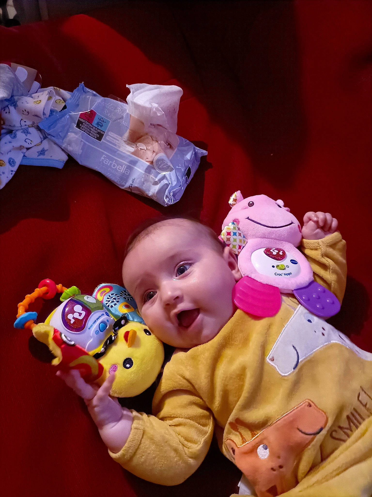 Hilona participe au concours pour gagner de l'argent avec cette photo : baby, baby_products, baby_toddler_clothing, baby_toys, carmine, cheek, child, event, finger, fun, happy, person, pink, play, product, red, smile, stuffed_toy, textile, toddler