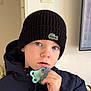 beanie, blue_eyes, casual, child, closeup, curious, expression, face, hand, hat, headwear, indoor, jacket, pacifier, person, portrait, toddler, warm_clothing, winter_clothing, young_child