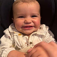 Melody-Rose joined the competition — help win amazing prizes! baby, smile, child, infant, hands, blanket, bow, cute, happy, indoor, clothing, person, portrait, seated, closeup, face, cheeks, button, knitwear, warm