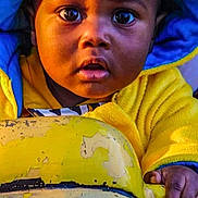 Cody joined the competition — help win amazing prizes! toddler, child, face, eyes, hoodie, yellow_clothing, blue_clothing, hand, curious, close_up, portrait, outdoor, toy, grip, expression, young_child, skin, person, baby, clothing