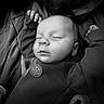 Aerith is registered to the contest to win money with this photo: newborn, baby, sleeping, portrait, black_and_white, close_up, face, eyes_closed, knitwear, sweater, blanket, cozy, peaceful, infant, head, hands, indoors, soft_lighting, monochrome, nap