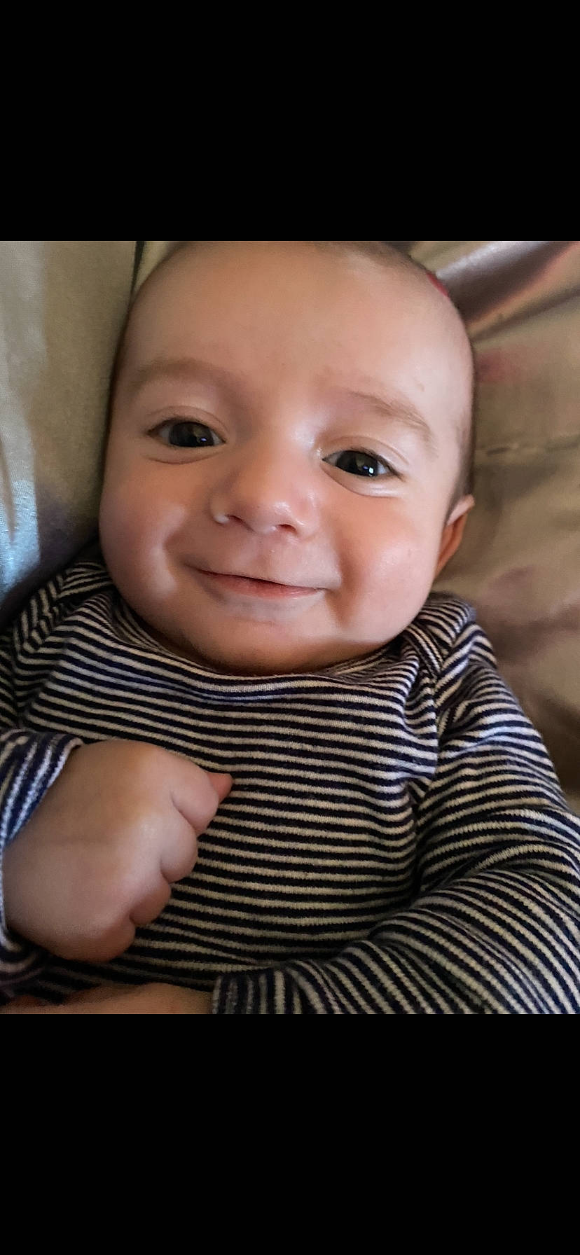 Carter is registered to the contest to win money with this photo: baby, baby_toddler_clothing, cheek, child, chin, collar, comfort, facial_expression, flash_photography, gesture, happy, iris, joy, lip, mouth, nose, person, skin, sleeve, smile
