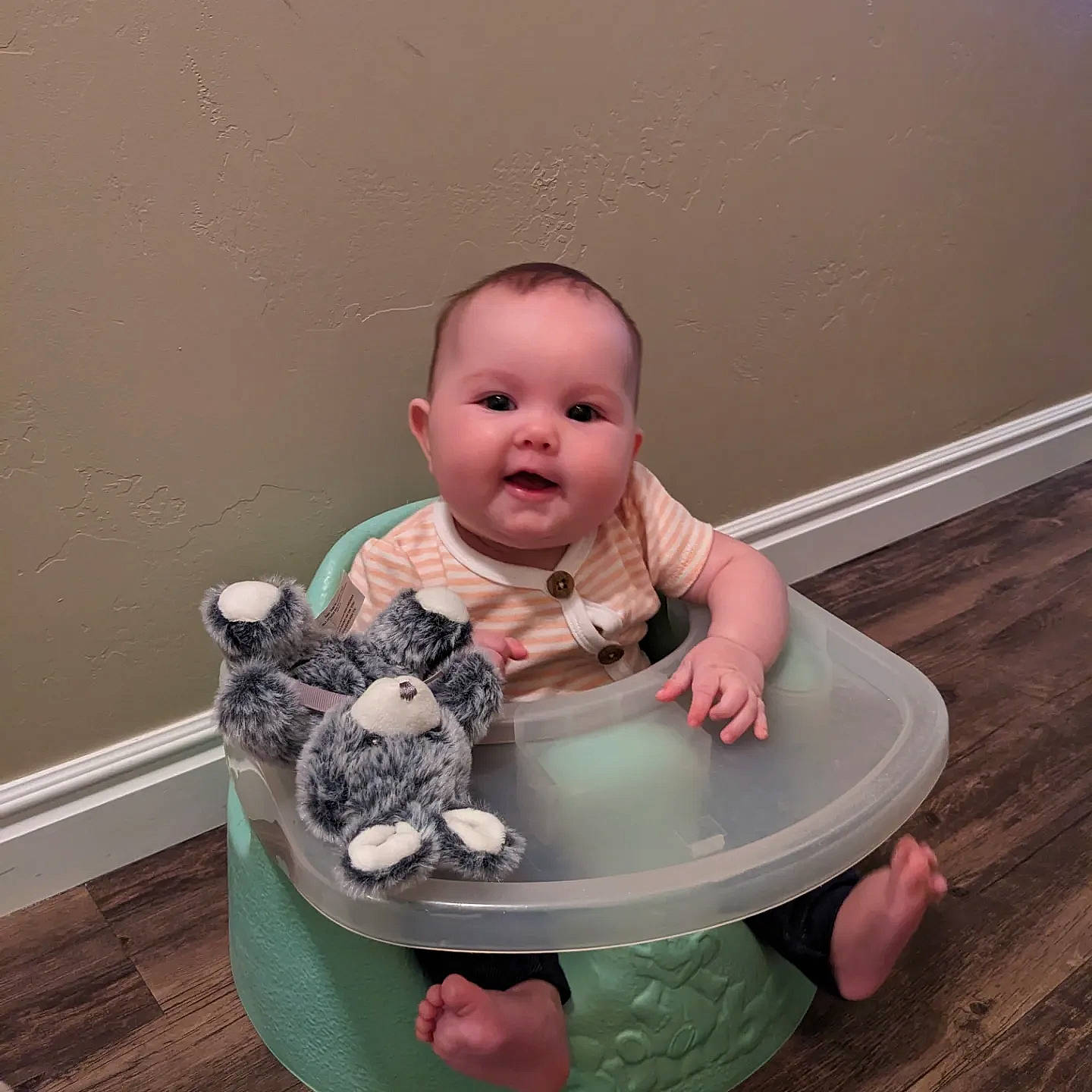 Lily is registered to the contest to win money with this photo: baby, baby_products, baby_toddler_clothing, baby_toys, bathing, carmine, cheek, child, circle, dishware, foot, person, pink, plastic, room, sitting, sleeve, toddler, toy, wood