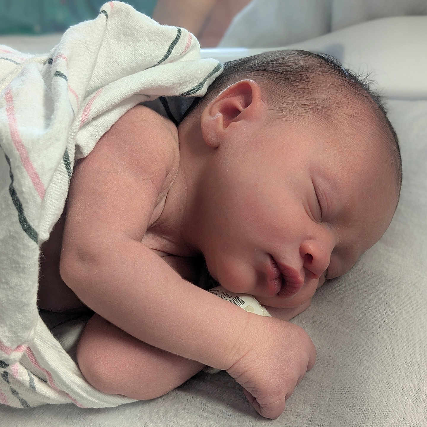 Emi joined the competition — help win amazing prizes! baby, bed, blanket, child, closeup, comfort, cozy, cute, face, hand, indoors, infant, newborn, peaceful, portrait, rest, skin, sleeping, soft, toddler