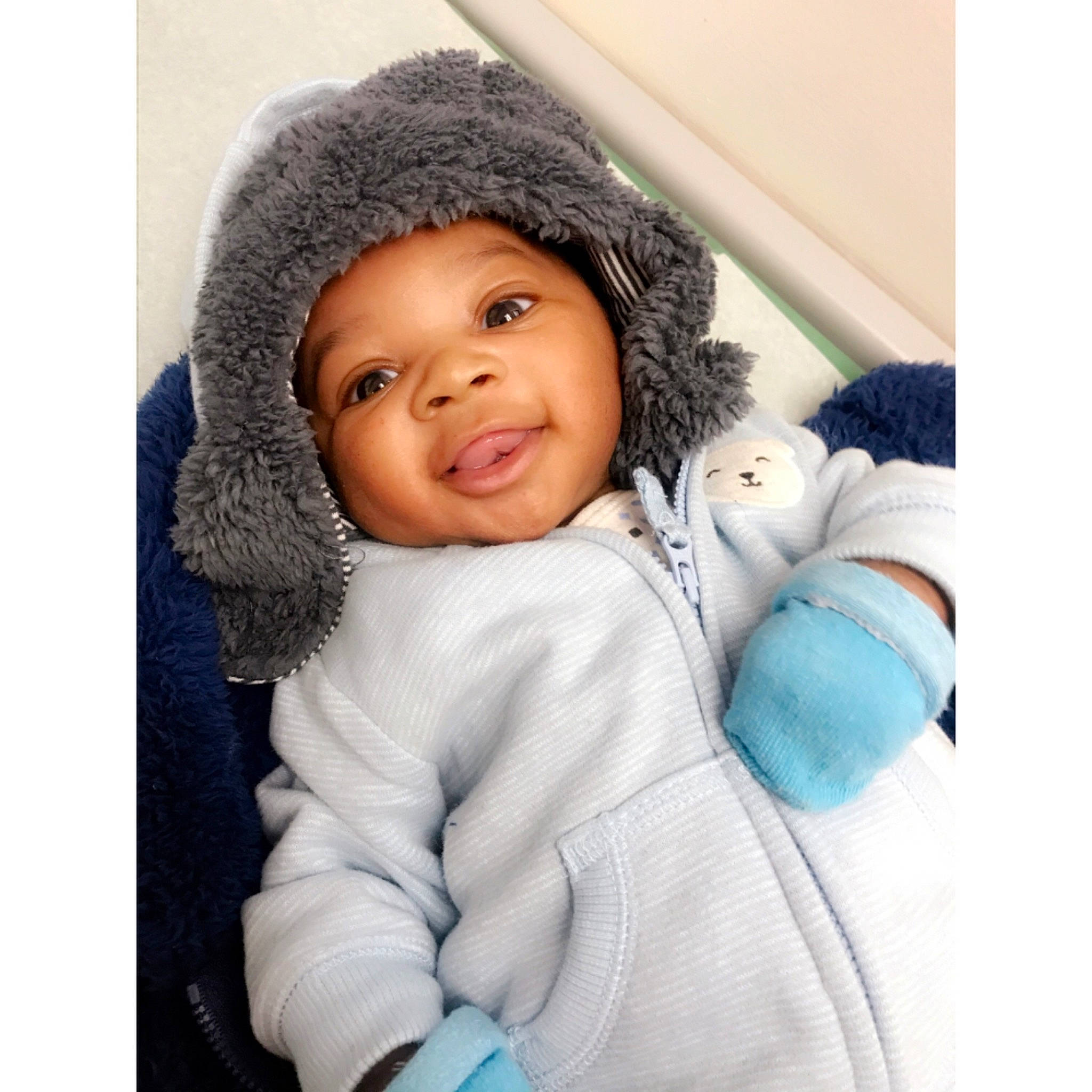 Javion is registered to the contest to win money with this photo: baby, beanie, beauty, bonnet, cheek, child, cool, fur, happy, head, headgear, hood, hoodie, knit_cap, outerwear, person, skin, smile, toddler, winter