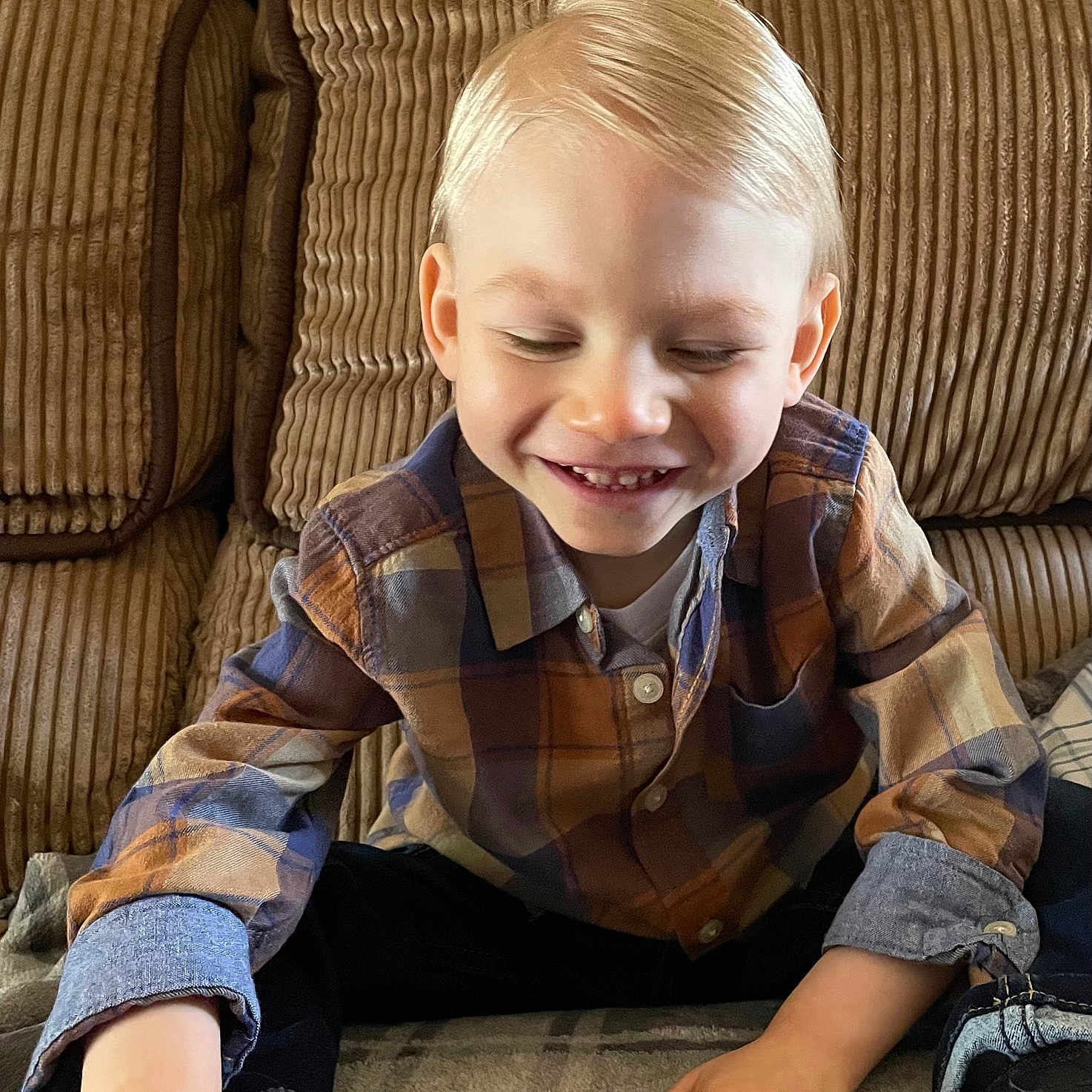 Ayden joined the competition — help win amazing prizes! blonde, boy, child, clothing, couch, face, footwear, furniture, hair, head, indoors, male, pants, person, photography, portrait, shirt, shoe, sitting, sneaker