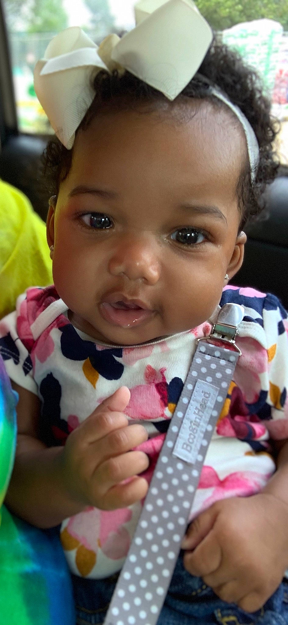 Haley joined the competition — help win amazing prizes! baby, black_hair, cheek, child, eating, eye, face, forehead, hair_accessory, head, lip, mouth, nose, person, play, skin, smile, toddler