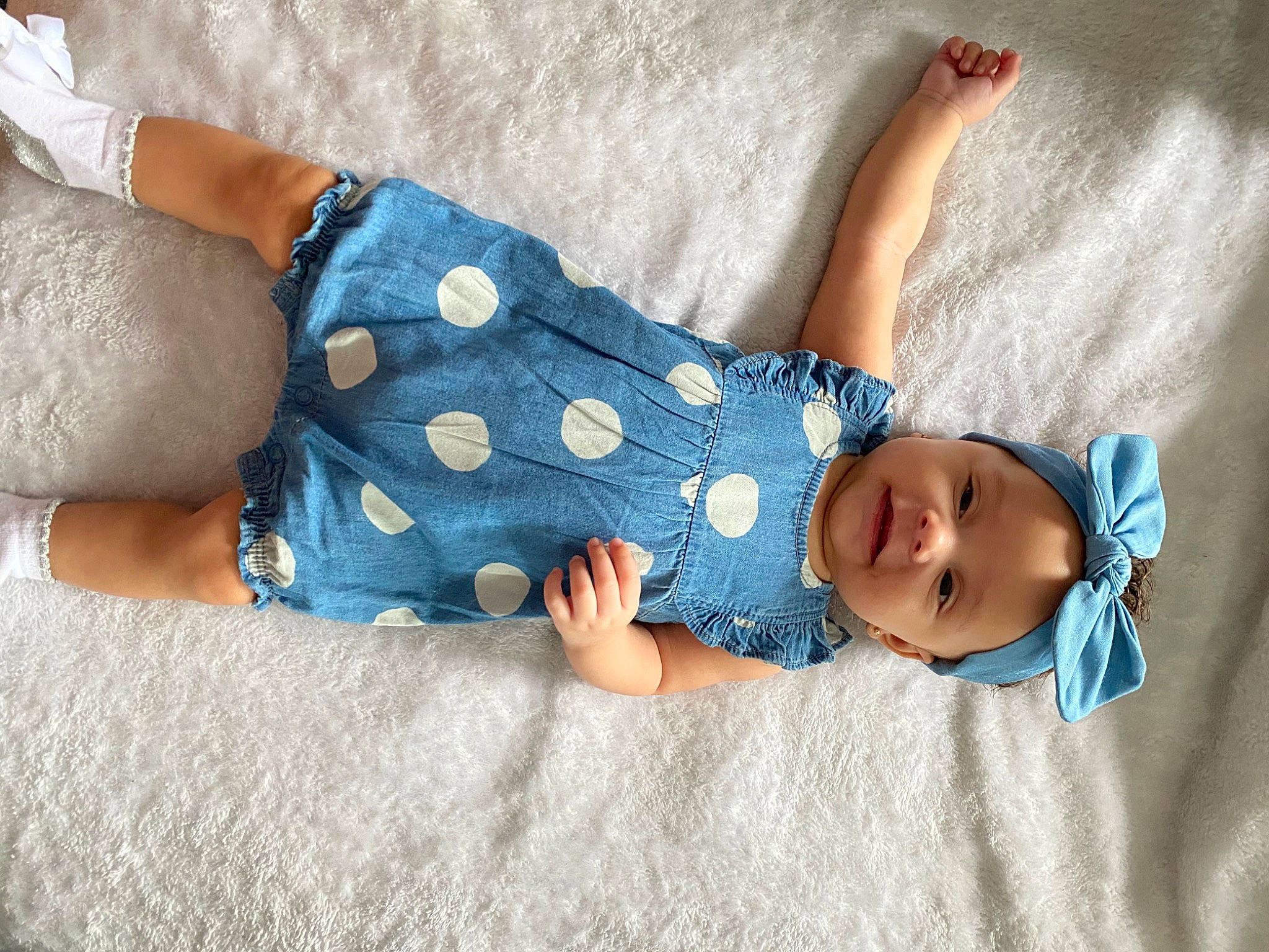 Augustina is registered to the contest to win money with this photo: arm, azure, baby, baby_sleeping, baby_toddler_clothing, child, comfort, electric_blue, finger, hand, headgear, headwear, leg, linens, pattern, person, skin, sleeve, textile, thigh