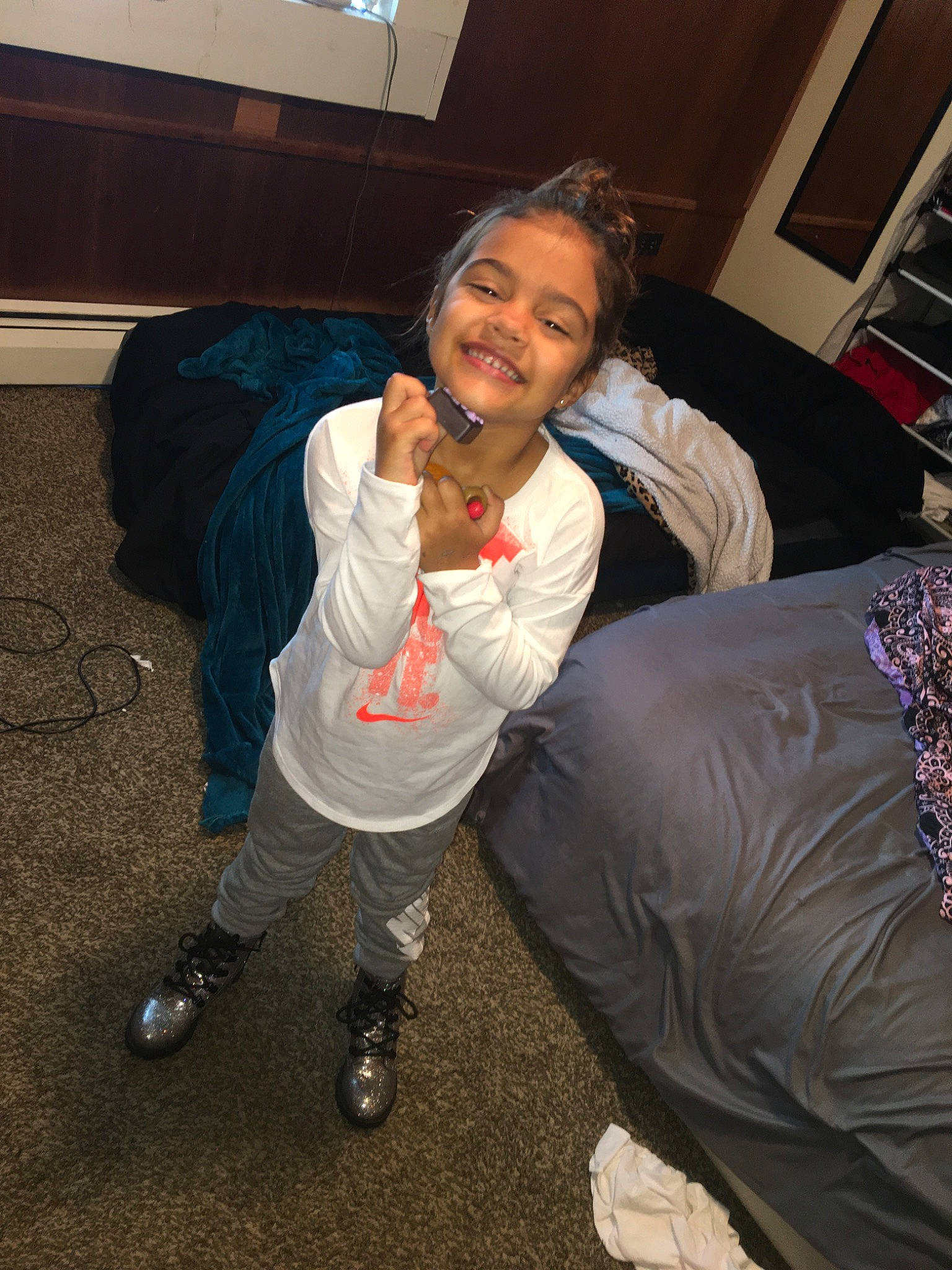 Cecelia is registered to the contest to win money with this photo: fun, joy, leg, long_hair, person, shoe, sitting, smile, textile