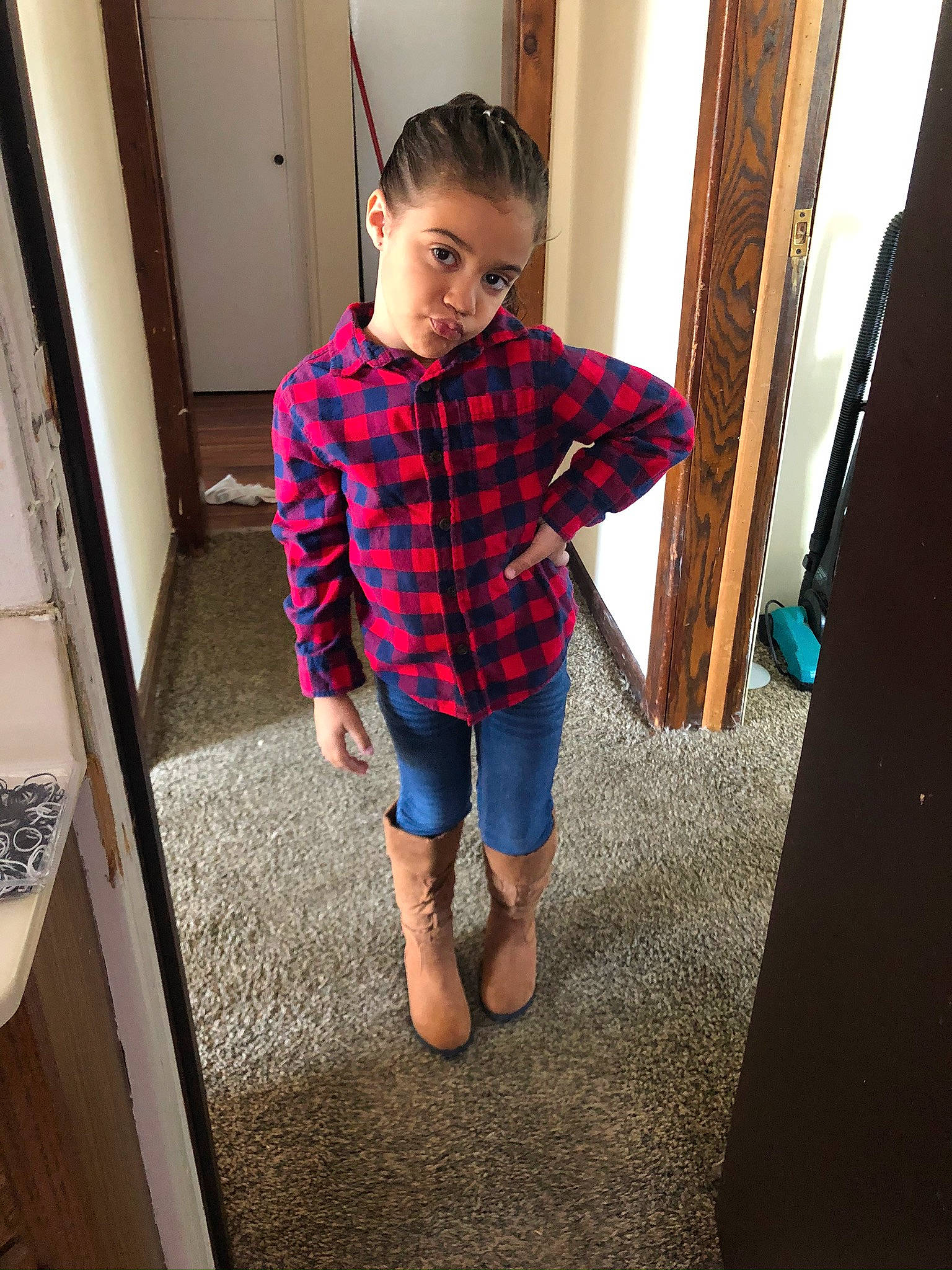 Cecelia is registered to the contest to win money with this photo: child, clothing, design, dress, footwear, leg, outerwear, pajamas, pattern, person, plaid, shoe, shorts, shoulder, sleeve, sportswear, standing, t_shirt, tartan, textile