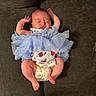 baby, infant, sleeping, couch, tutu, blue_dress, diaper, portrait, indoors, furniture, lying_down, peaceful, cute, child, barefoot, raised_arms, closed_eyes, textured_fabric, home, photography