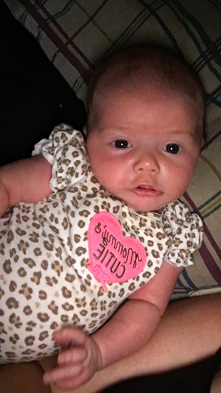 Kenzley joined the competition — help win amazing prizes! baby, baby_products, baby_toddler_clothing, cheek, child, design, eye, face, finger, forehead, head, lip, nose, pattern, person, pink, product, skin, smile, toddler