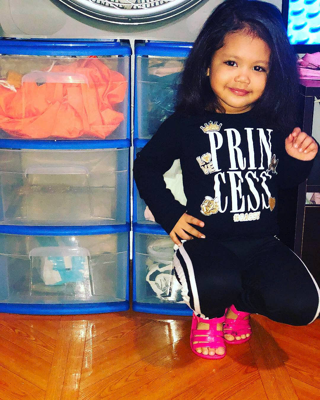 Mariah is registered to the contest to win money with this photo: child, electric_blue, footwear, jeans, joy, outerwear, person, pink, shoe, sportswear, t_shirt, toddler, trousers