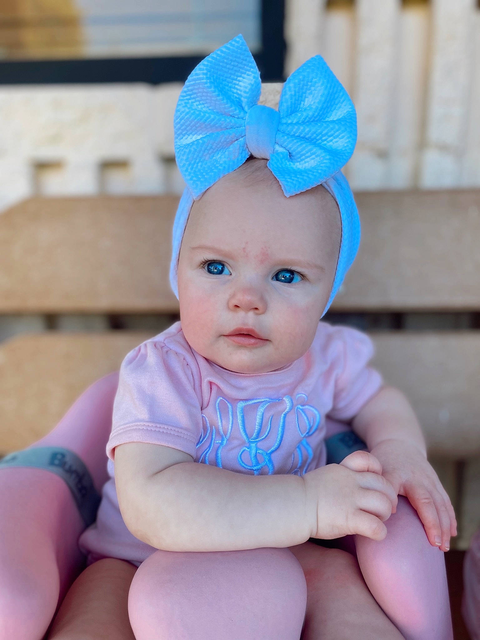 Willa Beck is registered to the contest to win money with this photo: baby, baby_toddler_clothing, blue, cap, cheek, chin, costume_hat, electric_blue, face, fashion_accessory, hair_accessory, happy, hat, headband, headwear, pattern, person, pink, sitting, skin