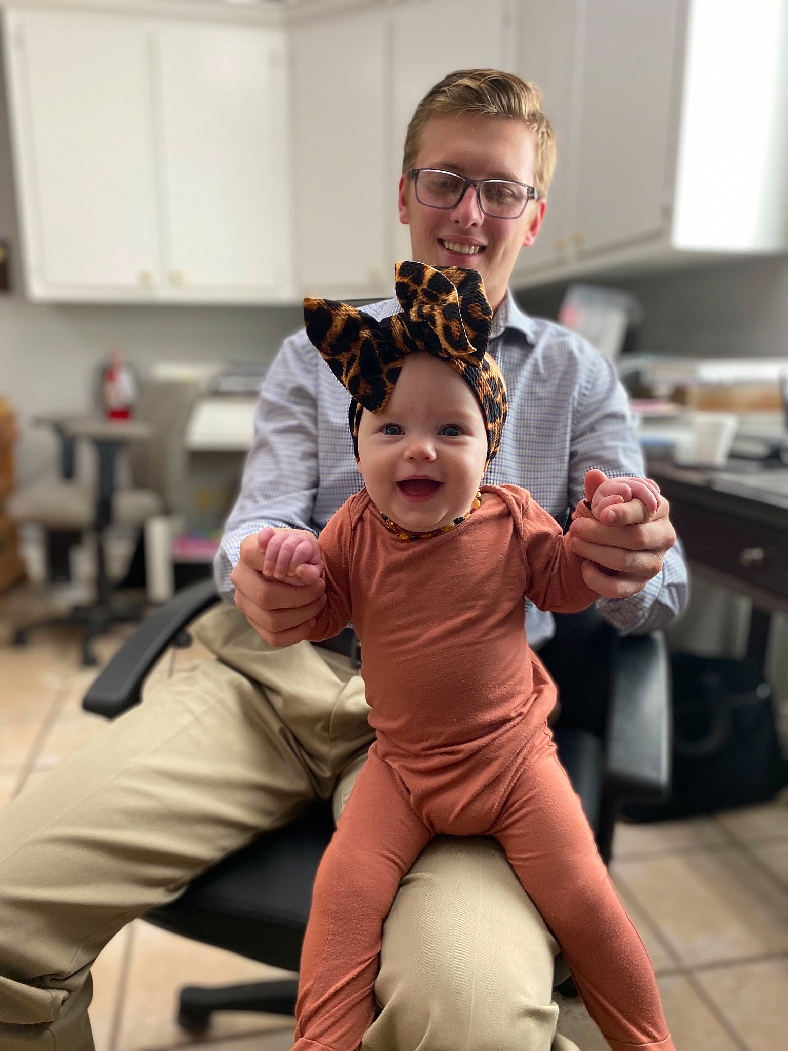 Willa Beck is registered to the contest to win money with this photo: baby, chair, child, costume, event, eyewear, face, fashion_design, fictional_character, flooring, fun, gesture, happy, headwear, joint, joy, person, recreation, room, sitting