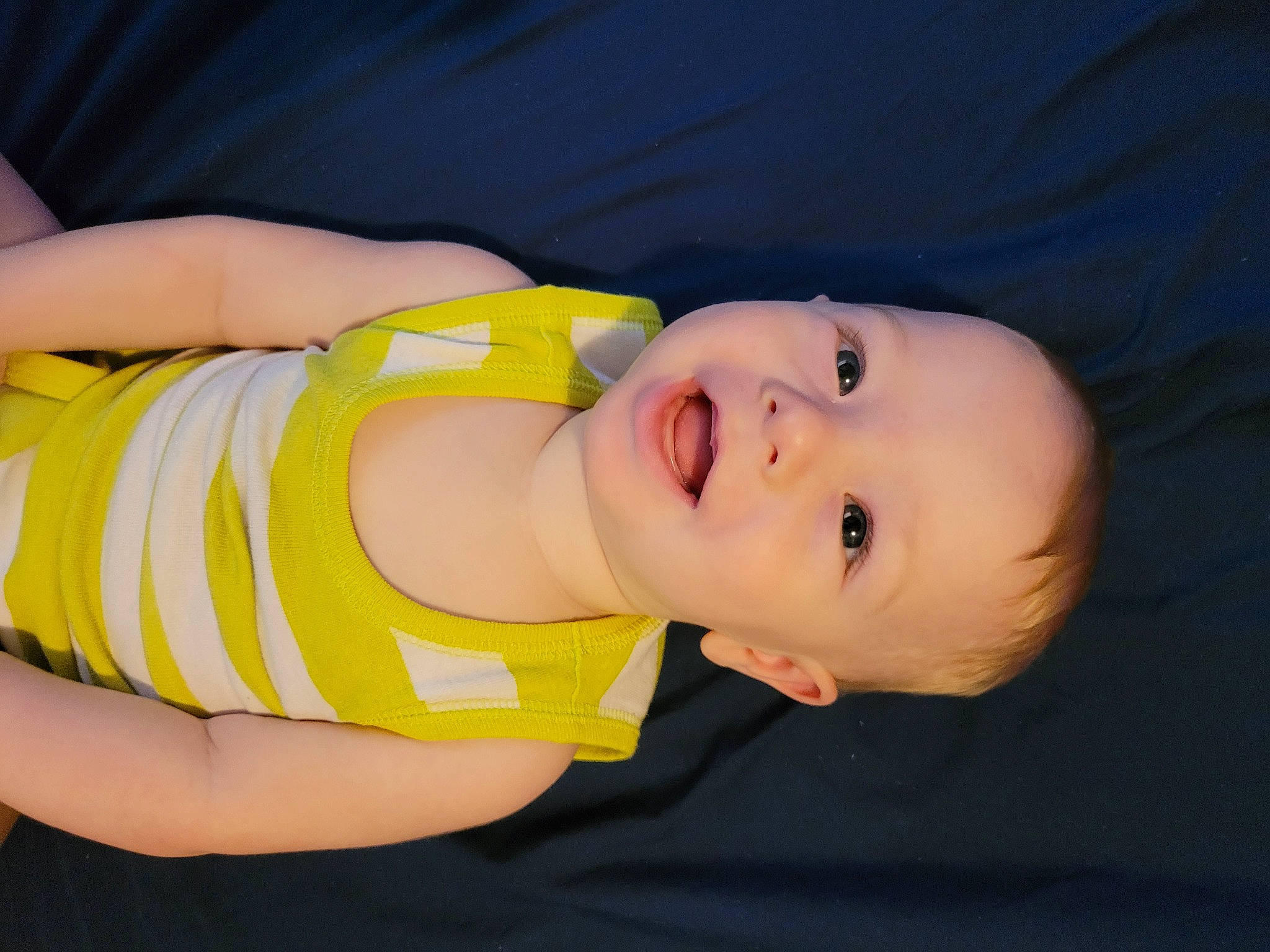 Holland is registered to the contest to win money with this photo: abdomen, baby, baby_products, baby_toddler_clothing, cheek, chest, child, elbow, electric_blue, eyelash, happy, human_body, nose, pattern, person, sleeve, throat, toddler, wrist