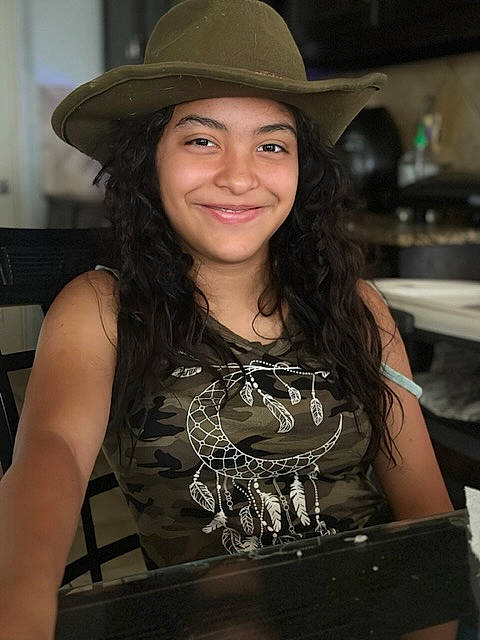 Kaylee is registered to the contest to win money with this photo: beauty, black_hair, brown_hair, chest, cowboy_hat, event, fashion_accessory, fashion_design, fedora, flash_photography, fun, happy, hat, headwear, jewellery, joy, long_hair, necklace, person, portrait_photography