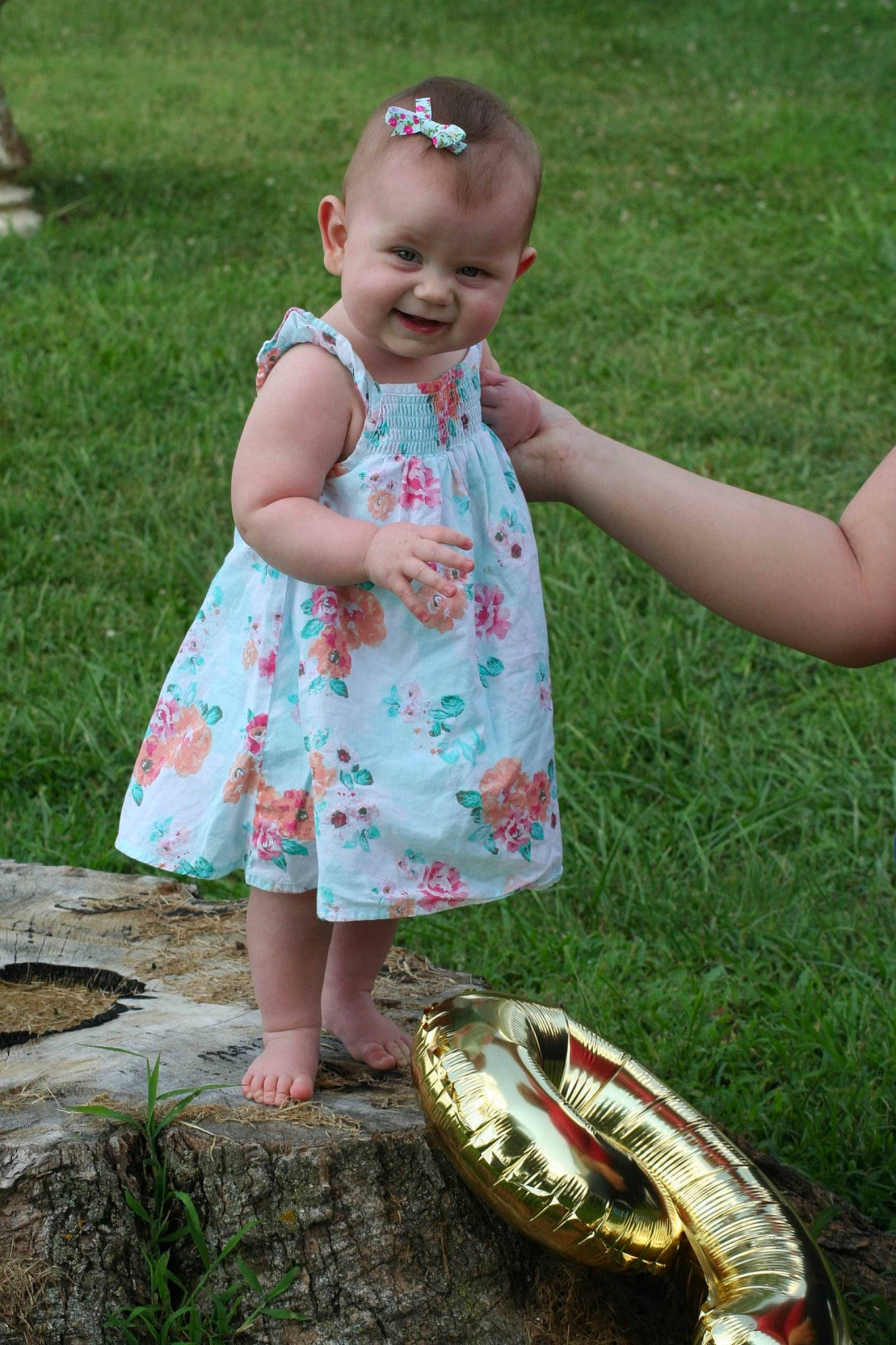 Brynleigh is registered to the contest to win money with this photo: automotive_tire, automotive_wheel_system, baby, baby_toddler_clothing, child, dress, event, fun, garden, grass, happy, joy, lawn, leisure, pattern, people_in_nature, person, play, recreation, sitting