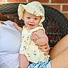 Zella joined the competition — help win amazing prizes! baby, blue_shorts, brick_wall, bright, casual, child, cute, dress, happy, hat, holding, infant, outdoor, person, pink_socks, portrait, sitting, smiling, sun_hat, wicker_chair