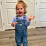 Valentina joined the competition — help win amazing prizes! toddler, child, standing, denim_overalls, curly_hair, pony_tail, barefoot, indoor, wooden_floor, door, light_switch, balloon_string, purple_shirt, smiling, happy, person, young_child, home, casual_clothing, playful