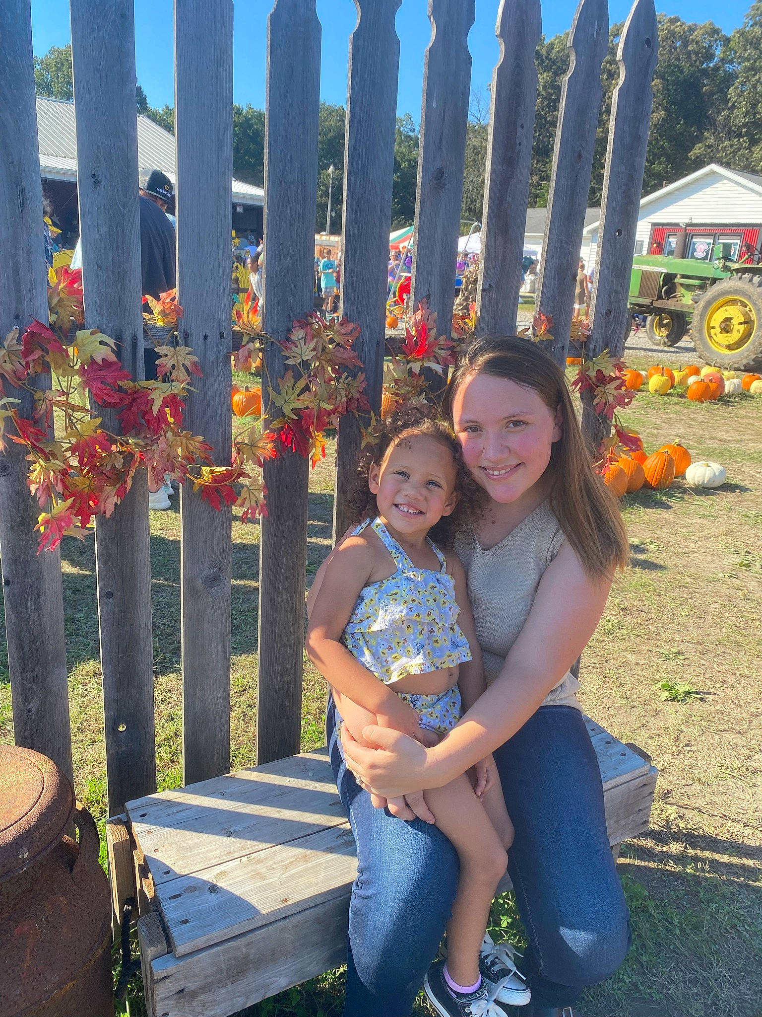 Calyn Rae is registered to the contest to win money with this photo: botany, community, daytime, fence, fun, grass, happy, jeans, joy, leaf, leisure, organ, people_in_nature, person, plant, public_space, sky, smile, travel, tree