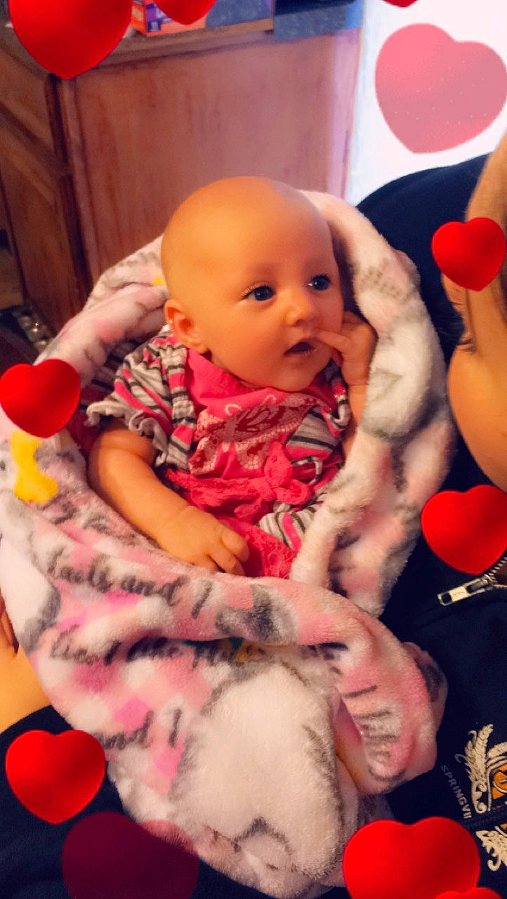 Arlee is registered to the contest to win money with this photo: baby, cheek, child, head, headwear, person, skin, toddler