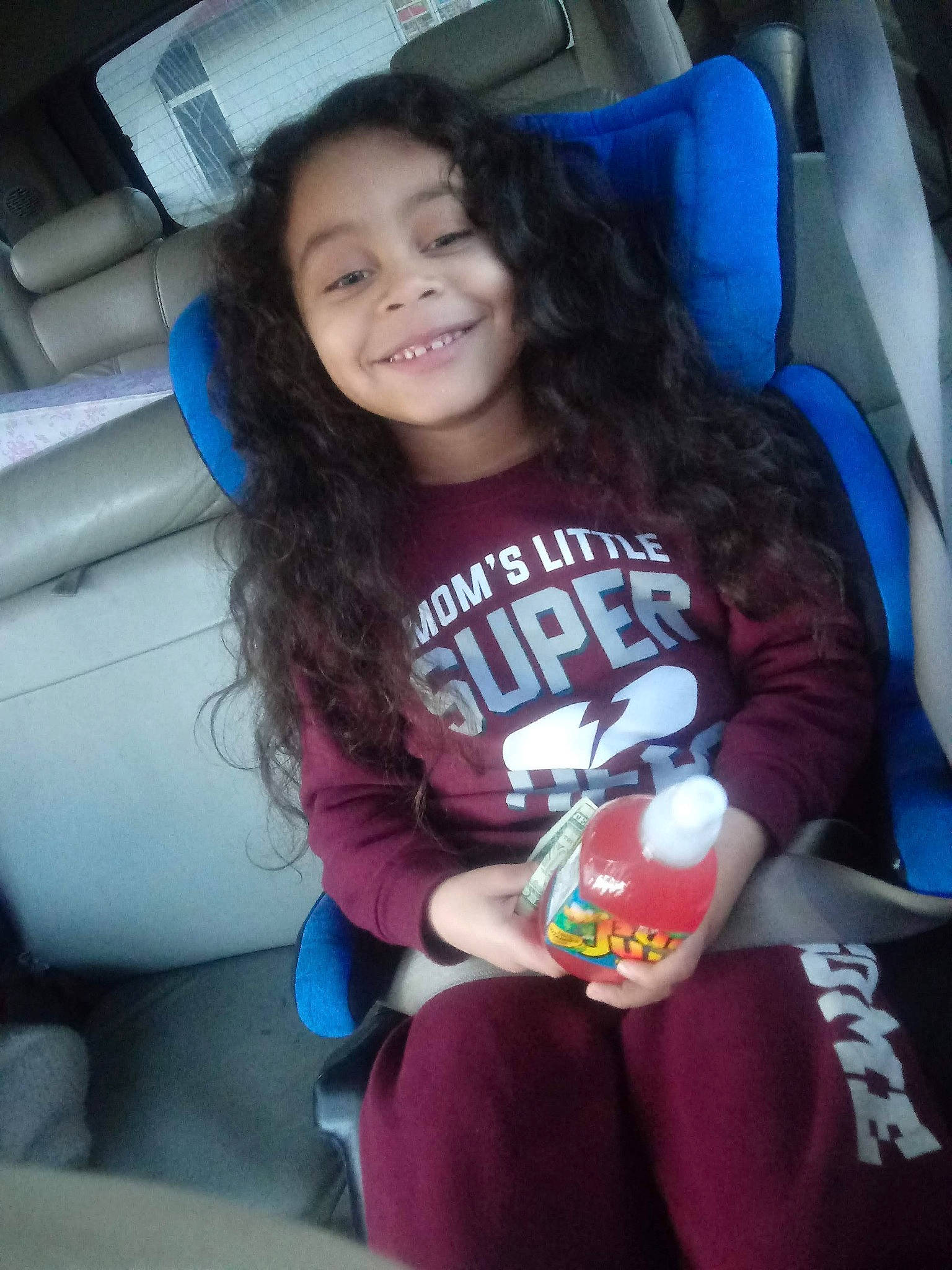 Terrence is registered to the contest to win money with this photo: black_hair, child, cool, joy, long_hair, person, smile