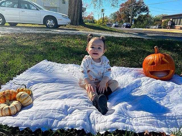 Brianne joined the competition — help win amazing prizes! automotive_tire, calabaza, car, cucurbita, dress, gourd, grass, leaf, morning, motor_vehicle, people_in_nature, person, plant, pumpkin, tire, toddler, tree, vegetable, vehicle, wheel