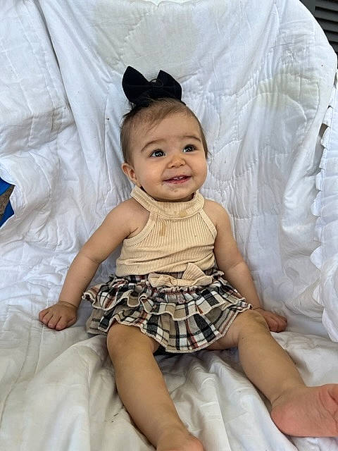 Brianne joined the competition — help win amazing prizes! baby, baby_toddler_clothing, comfort, day_dress, dress, embellishment, eye, eyelash, happy, headgear, iris, joy, one_piece_garment, person, pink, product, skin, sleeve, smile, textile