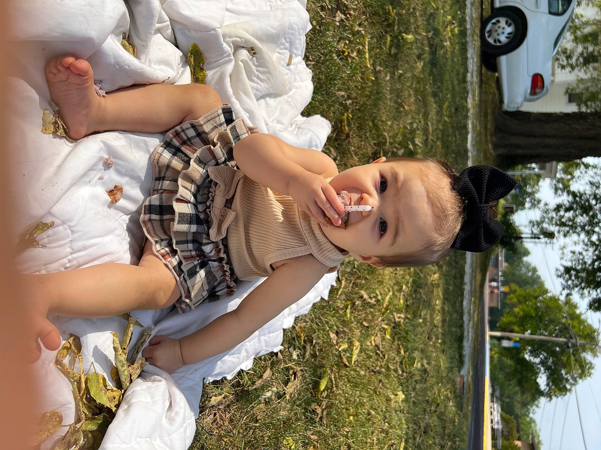 Brianne joined the competition — help win amazing prizes! abdomen, car, dress, fun, grass, happy, human_leg, leisure, person, plant, recreation, shorts, smile, soil, thigh, tire, toddler, tree, vehicle_door, wheel