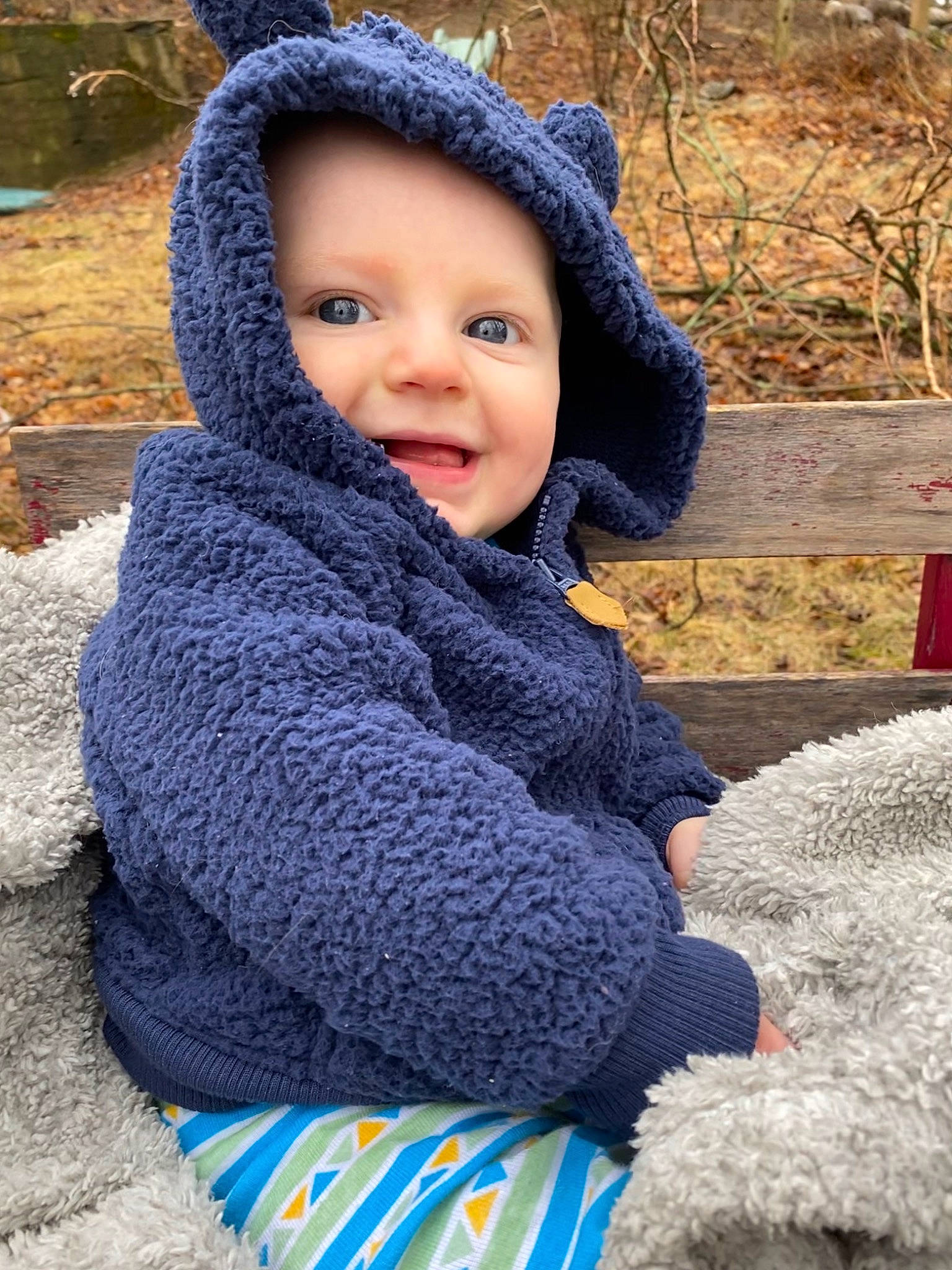 Brantley joined the competition — help win amazing prizes! baby, blue, cheek, child, face, head, headgear, headwear, hood, hoodie, knit_cap, knitting, outerwear, people, person, skin, sweater, textile, toddler, winter