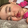 Daynelis is registered to the contest to win money with this photo: baby, blurred_background, child, close_up, cute, dog, drool, ear, face, hair, hand, indoor, peaceful, pink_suspender, portrait, resting, rosy_cheeks, sleeping, soft_surface, white_shirt