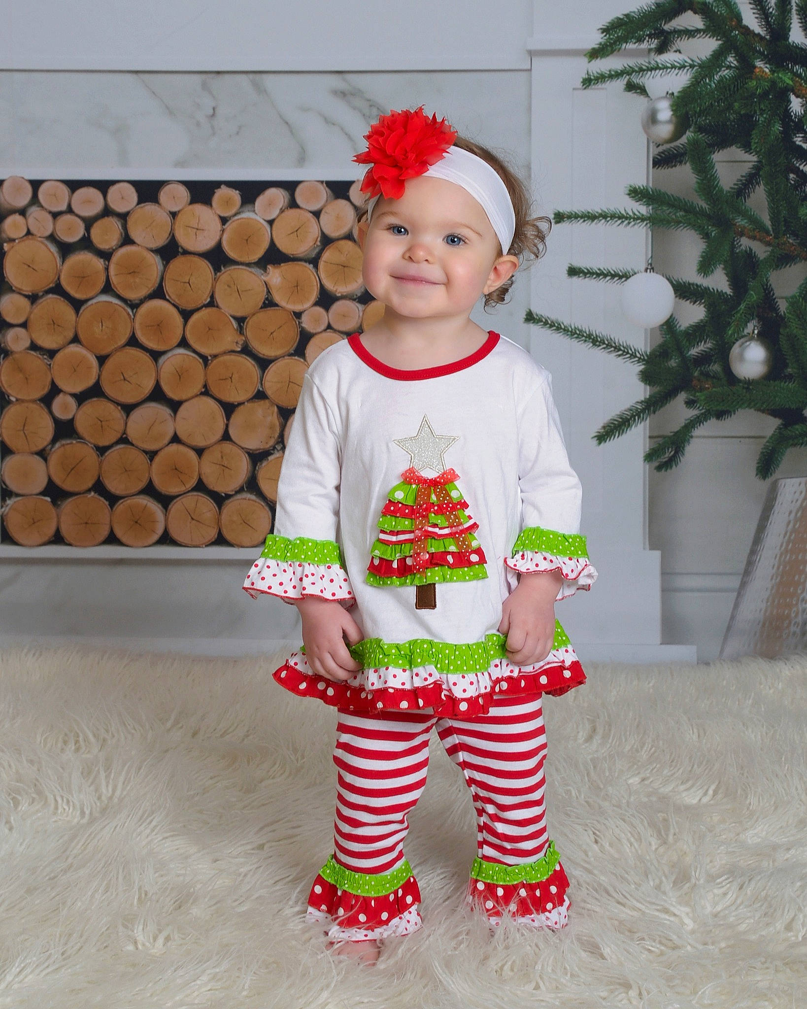 Olivia Isabella is registered to the contest to win money with this photo: child, christmas, costume, headgear, holiday, joy, material, pattern, person, product, red, shorts, sleeve, textile, toddler