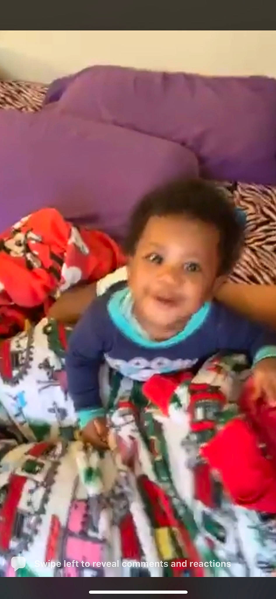 Kaeden is registered to the contest to win money with this photo: baby, baby_products, baby_toddler_clothing, carmine, cheek, child, event, fun, happy, head, holiday, joy, linens, person, play, room, sitting, smile, snapshot, t_shirt