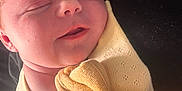 Amelia joined the competition — help win amazing prizes! adorable, baby, blanket, child, closeup, cozy, cute, face, human, infant, newborn, peaceful, portrait, resting, skin, sleeping, soft, wrapped, yellow_blanket, young