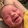 Amelia joined the competition — help win amazing prizes! baby, smiling, yellow_blanket, close_up, happy, infant, face, skin, arm, sleepy, newborn, cute, joy, child, human, person, indoors, soft_light, tender, comfort