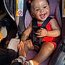 Royalty joined the competition — help win amazing prizes! baby, bracelet, car_interior, car_seat, child, cute, footwear, hair_clips, hand, happy, indoors, infant, portrait, red_outfit, seat, seatbelt, sitting, skin, smiling, white_sandals
