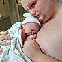 Jerry joined the competition — help win amazing prizes! newborn, baby, father, skin_to_skin, hospital_blanket, white_cap, bonding, family, love, parenthood, human, portrait, indoor, closeup, holding, comfort, tenderness, skin, newborn_baby, hospital