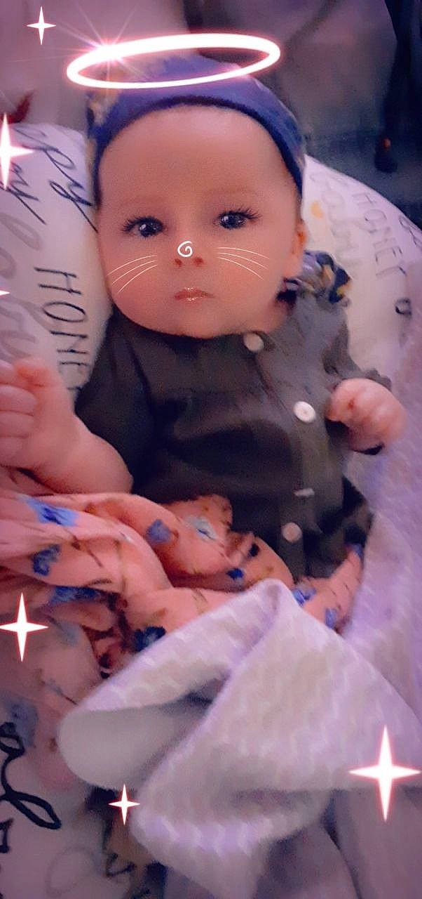 Estelle is registered to the contest to win money with this photo: baby, cheek, child, doll, person, skin, toddler