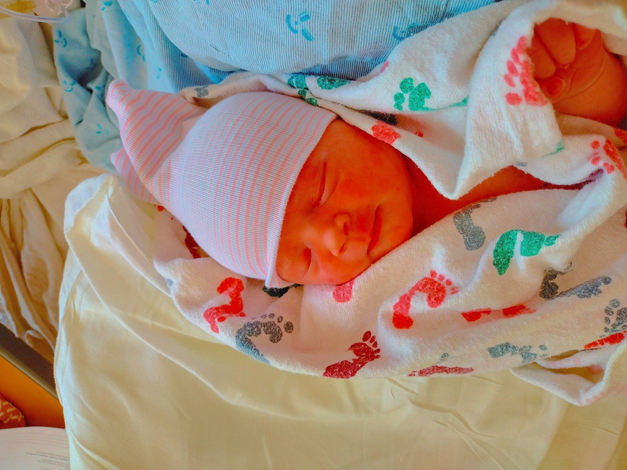 Macie joined the competition — help win amazing prizes! baby, baby_products, baby_sleeping, baby_toddler_clothing, child, comfort, event, hat, headwear, linens, orange, pattern, peach, person, product, room, skin, sleeve, textile, toddler