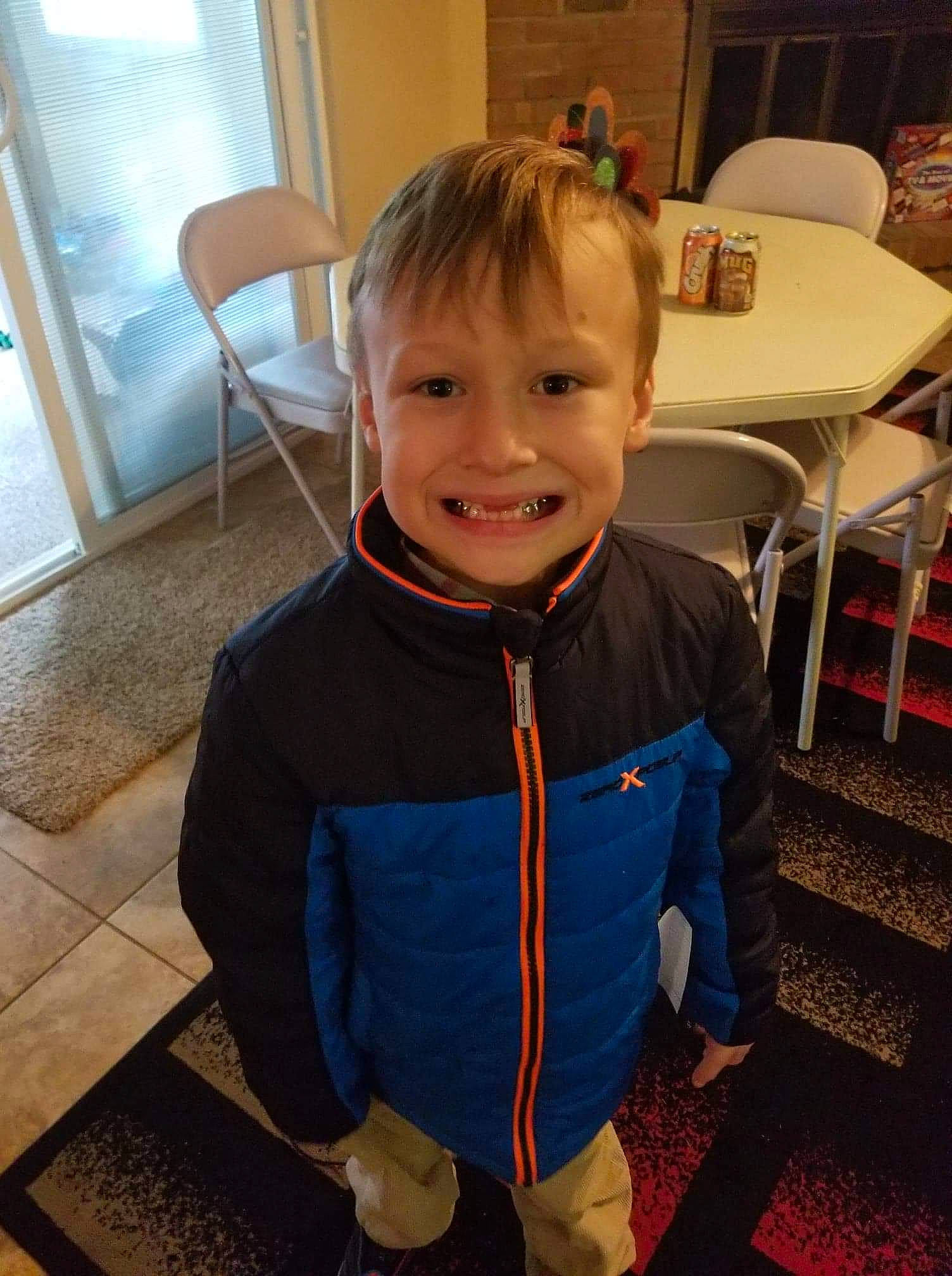 Ashtin is registered to the contest to win money with this photo: arm, boy, child, cool, day, facial_expression, fun, girl, hair, hairstyle, human, human_body, joy, organ, outerwear, person, product, skin, smile, standing