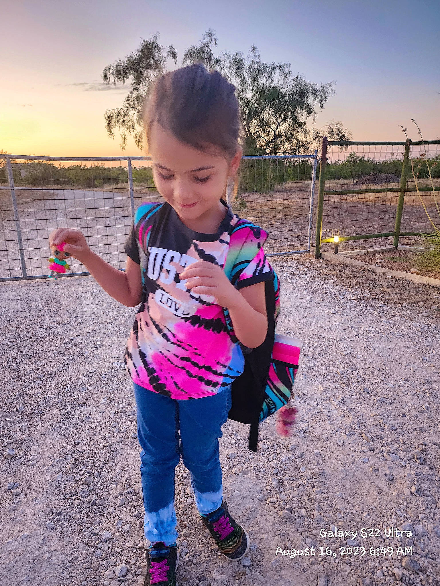 Lexi is registered to the contest to win money with this photo: child, eyewear, fun, grass, hand, happy, joy, landscape, leisure, magenta, people_in_nature, person, pink, plant, recreation, running, sky, sleeve, t_shirt, toddler