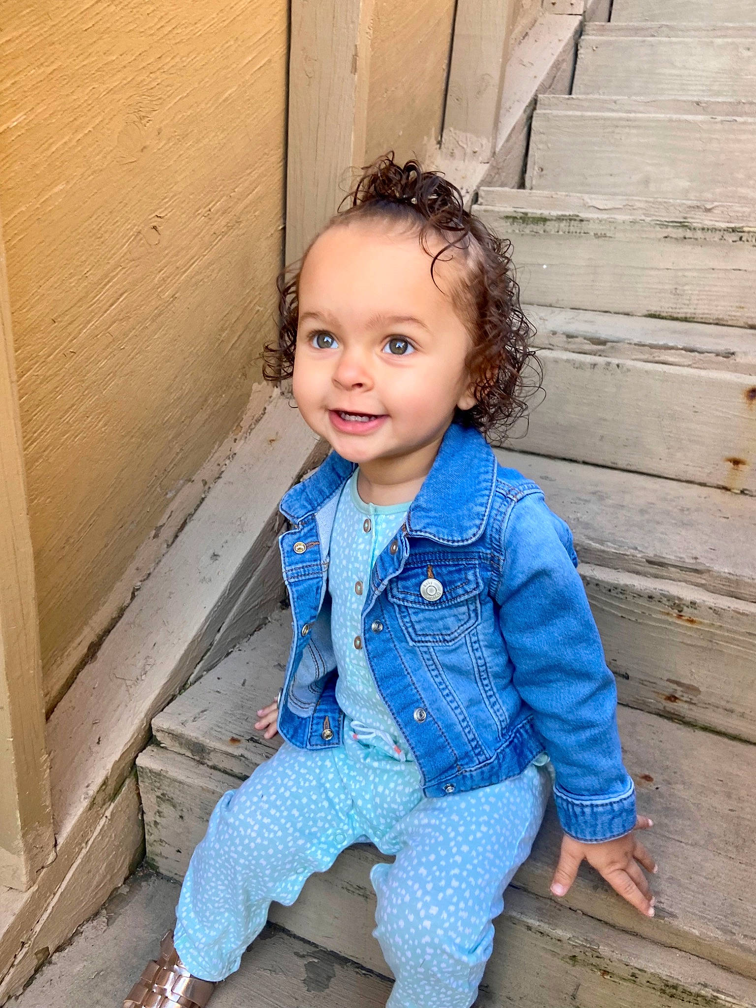 Amyla is registered to the contest to win money with this photo: baby_toddler_clothing, chin, clothing, dress, eye, facial_expression, hair, hairstyle, happy, head, iris, joy, lip, neck, outerwear, person, shoulder, skin, sleeve, smile