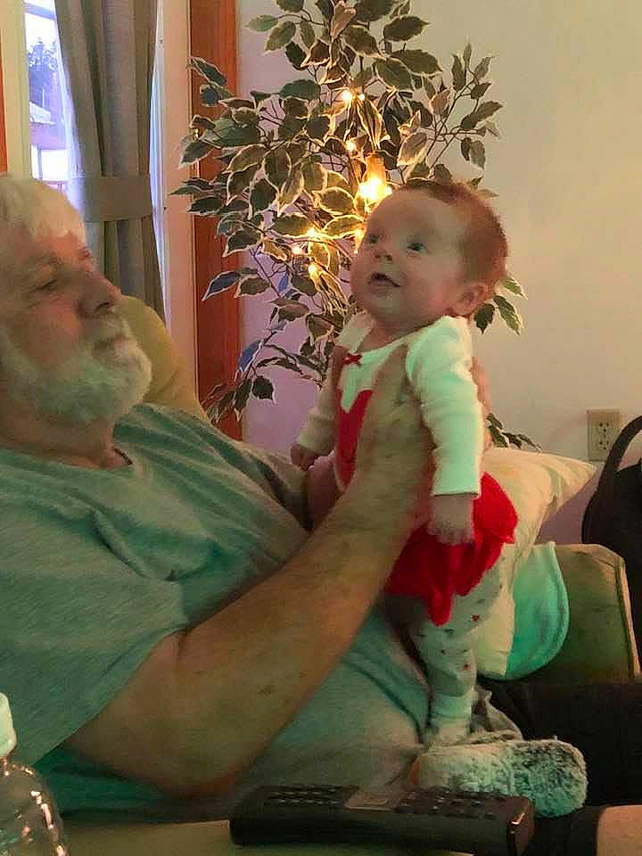 Aylah joined the competition — help win amazing prizes! child, christmas, christmas_eve, christmas_tree, fun, holiday, interior_design, lap, person, sitting, toddler