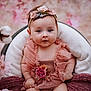 baby, infant, child, flower_headband, pink_dress, basket, cushion, portrait, cute, soft_lighting, flowers, ruffles, outdoor, nature, seasonal, adorable, sitting, face, skin, expression