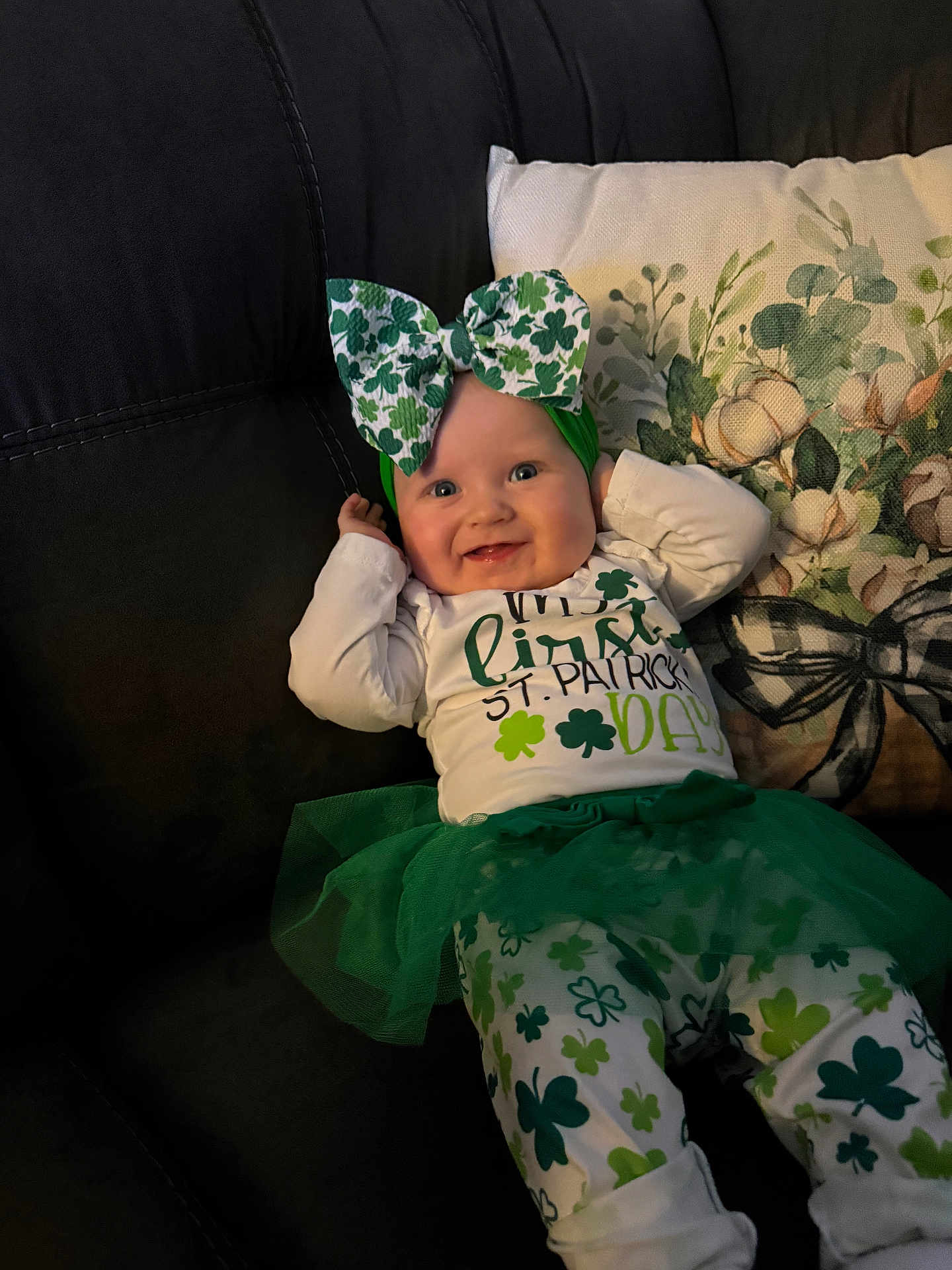 Willow joined the competition — help win amazing prizes! baby, infant, smiling, headband, bow, st_patricks, shamrock, green_clothing, tutu, onesie, pants, couch, pillow, floral_pillow, portrait, happy, lying_down, cute, holiday_outfit, indoor