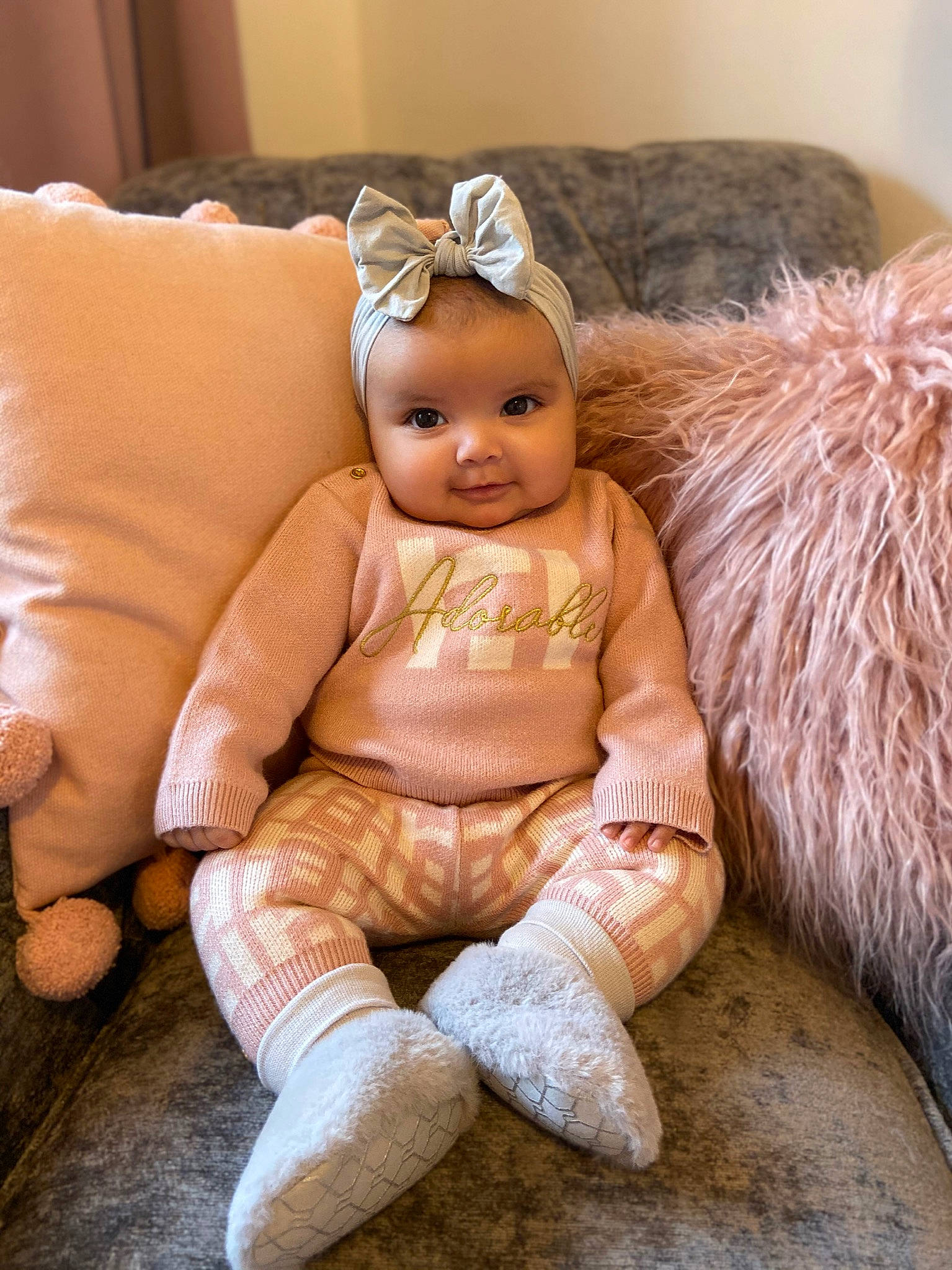 Inez is registered to the contest to win money with this photo: baby, blond, cheek, child, ear, fawn, fur, headgear, person, skin, toddler, toy