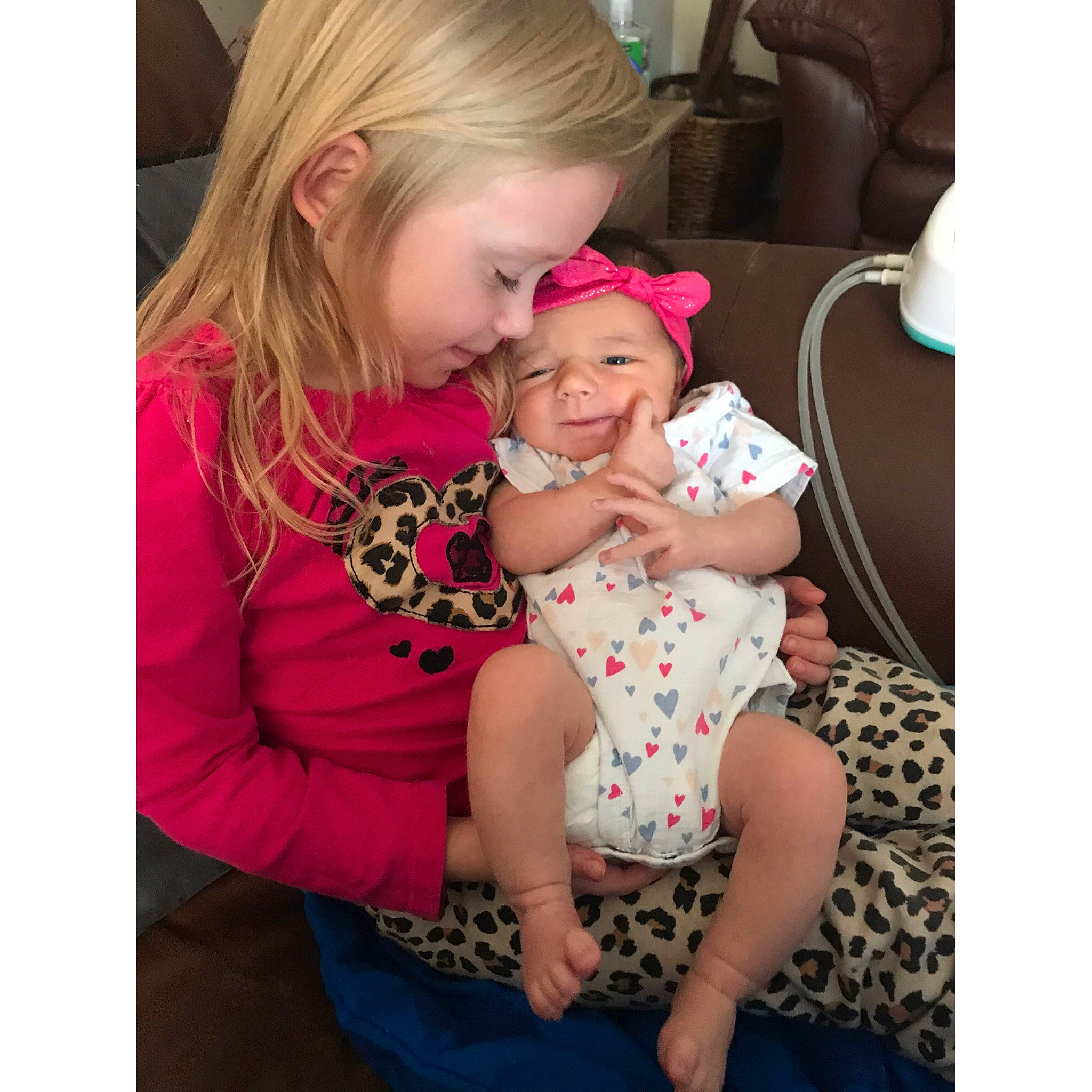 Sophia is registered to the contest to win money with this photo: baby, blond, cheek, child, design, dress, eye, face, head, headwear, human, iris, person, photography, pink, play, product, sitting, skin, smile