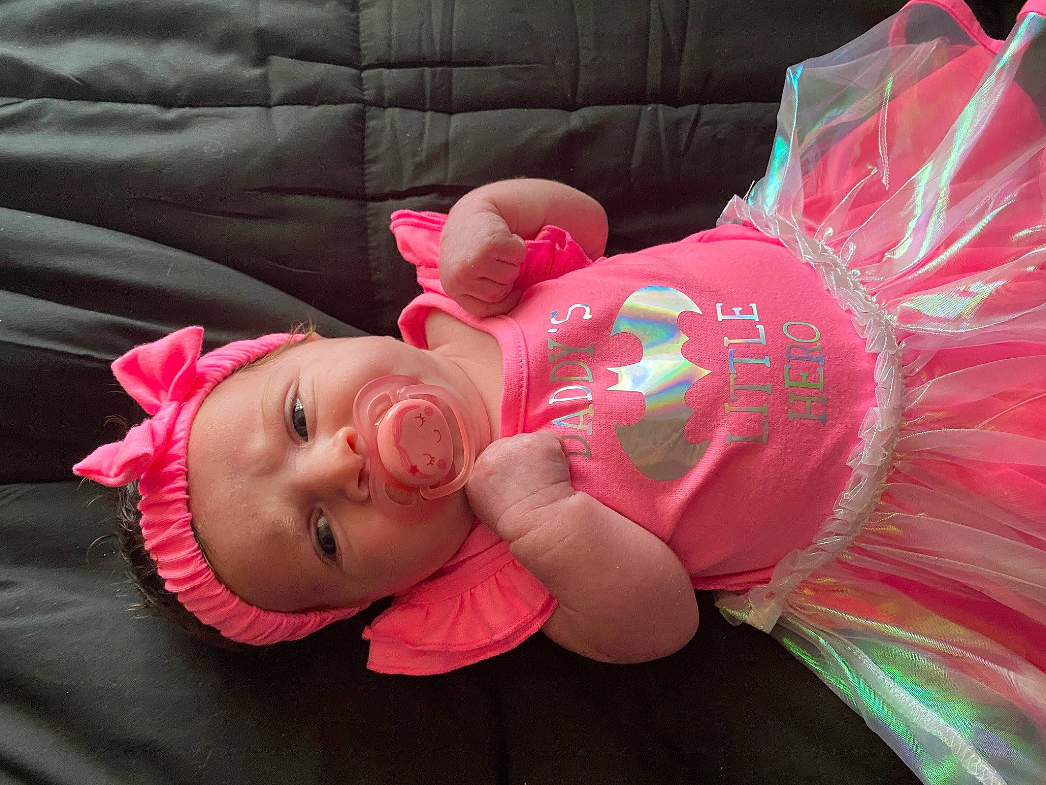 Adaleigh is registered to the contest to win money with this photo: baby, baby_products, child, costume, hair_accessory, person, pink, product, toddler